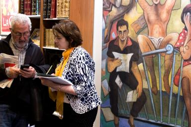 visitors arguing the works of art