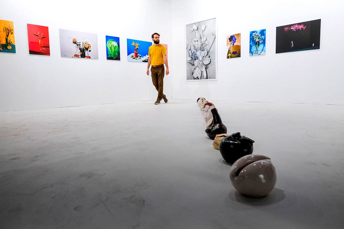 Visitor admiring a gallery at ARCO