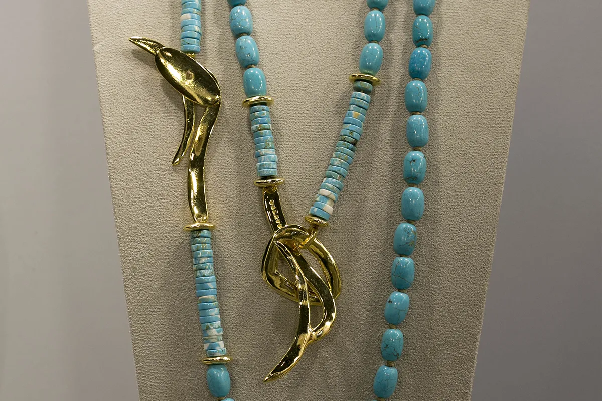 White spectacles resting on black glasses in Bisutex