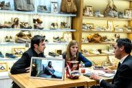 Man and woman in a shoe franchise