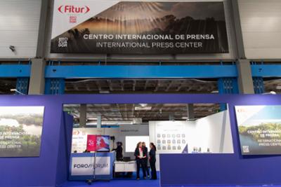 hostesses in front of a stand at FITUR's press centre