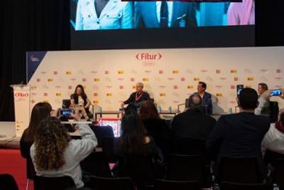 Speakers during a talk at Fitur Screen