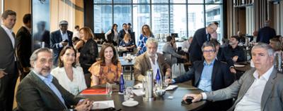 Los representantes de IFEMA MADRID, Cámara de comercio y Comunidad de Madrid sentados en una mesa durante la presentación de FITUR en Miami