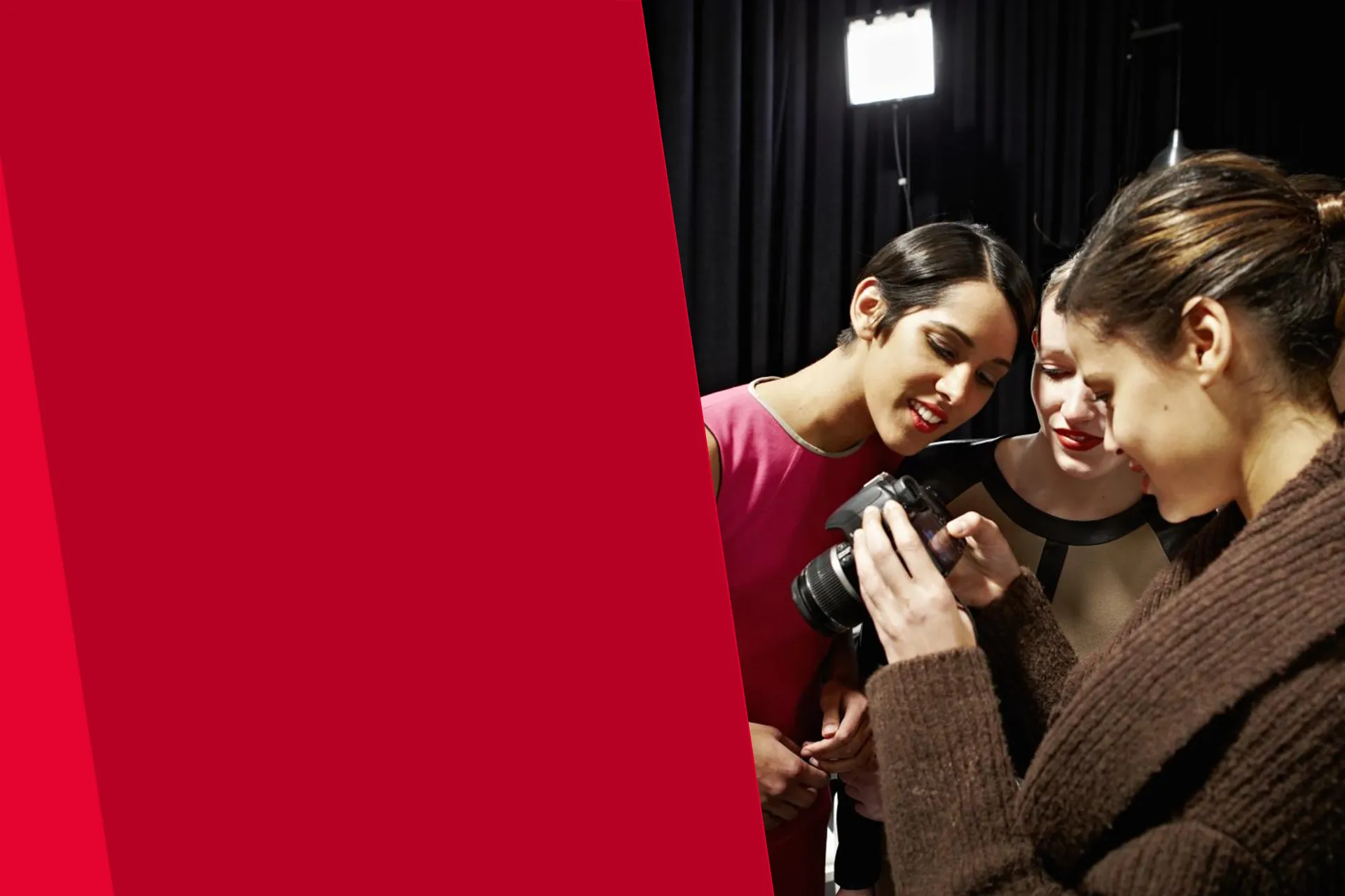 Three girls looking at a camera 22