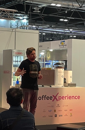 GUEXT's CoffeeXperience lecture person