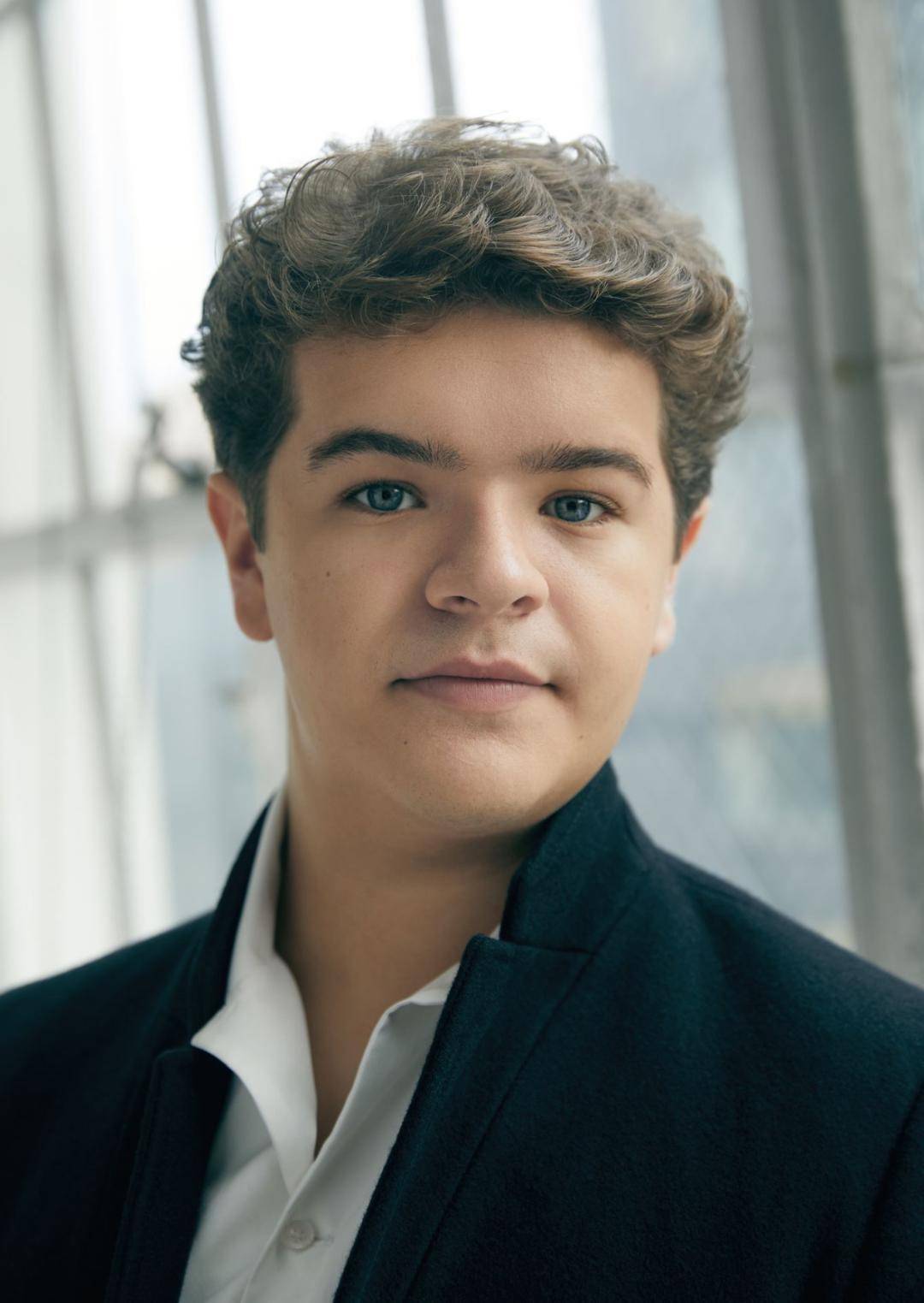 Gaten Matarazzo fotografiado para el evento de Stranger Things