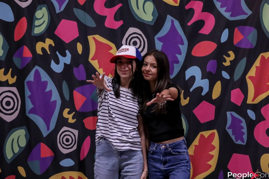 girls dressed as characters from Stranger Things posing for the photo