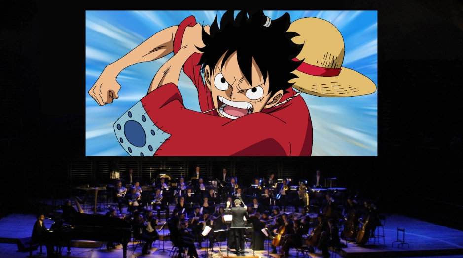 orquesta encima del escenario tocando musica de One Piece con escena de la serie