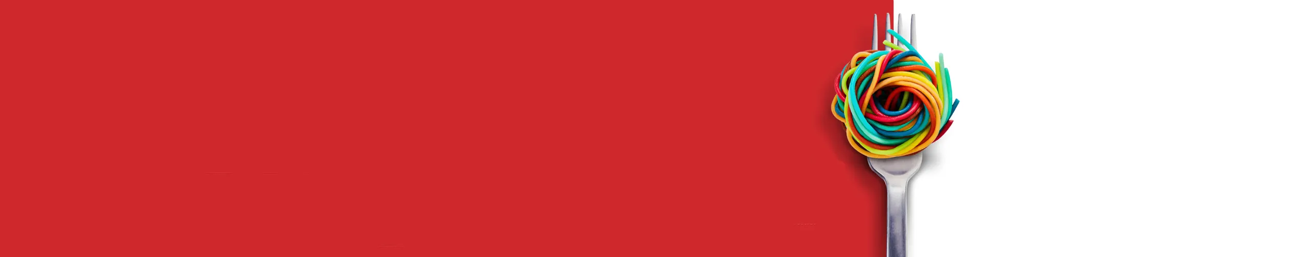 Fork with coloured spaghetti - Anuga