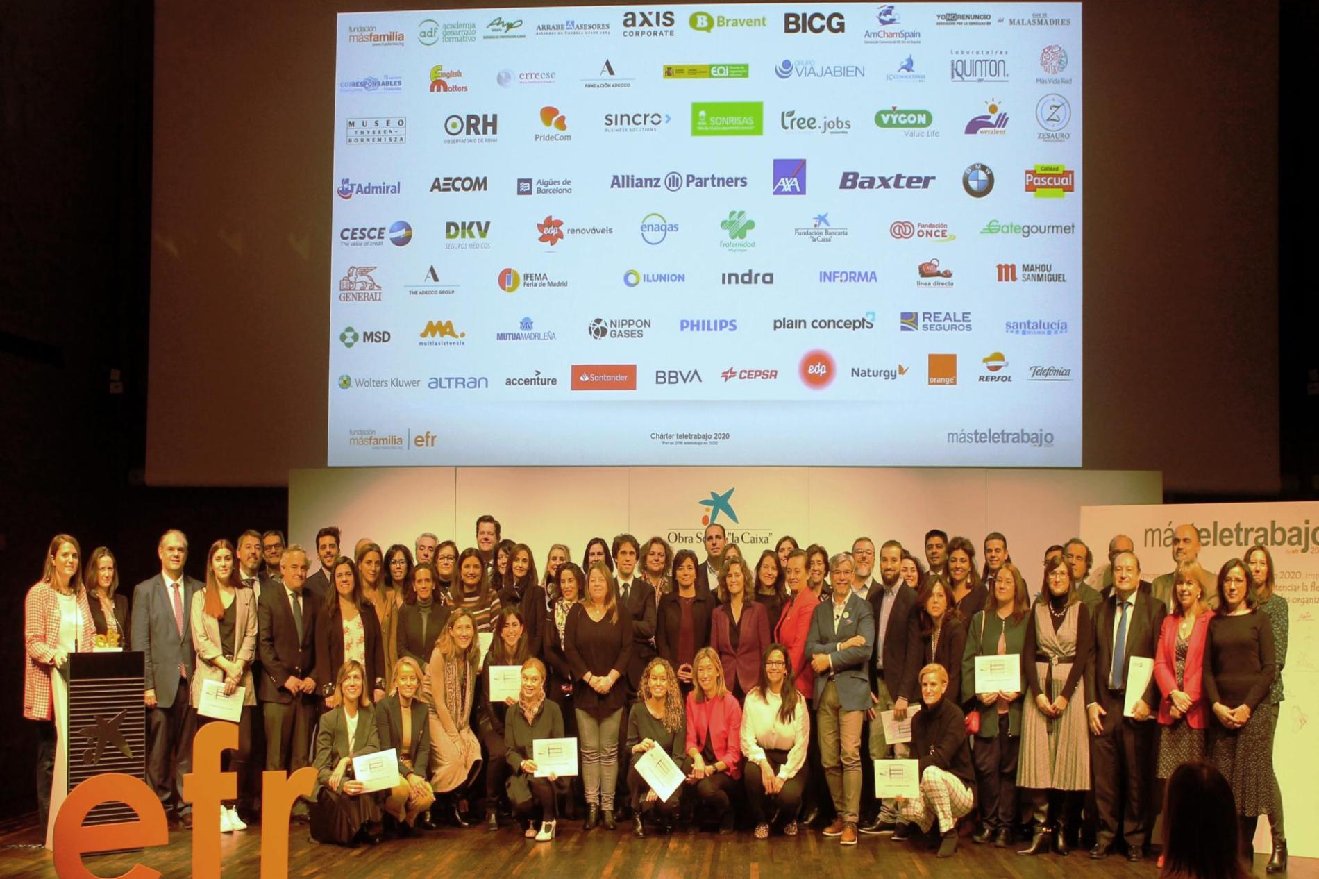 Family photo during the signing of the Telework and Flexibility Charter, promoted by Fundación Másfamilia