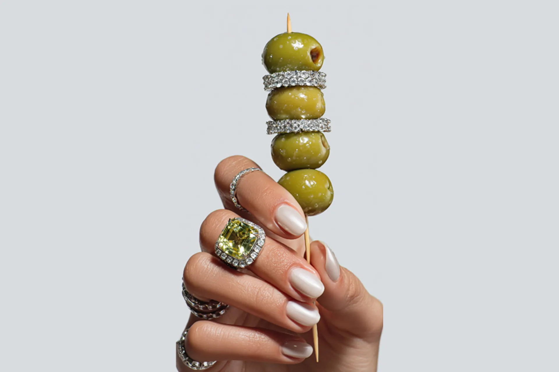Madridjoya's campaign image with a ring and a sketch