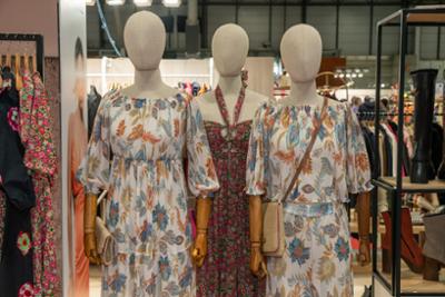 partial appearance of mannequins at a trade fair stand
