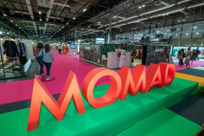 partial appearance in pavilion of the MOMAD logo