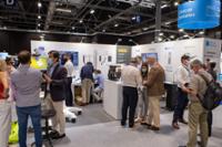 Stand with visitors.