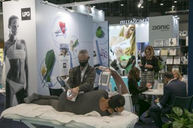 stand with a person on a stretcher molding her figure