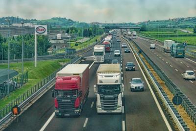 Two trucks on a highway