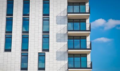 A building with balconies and windows.