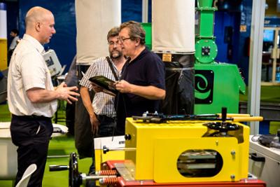 Visitor looking at brochure.