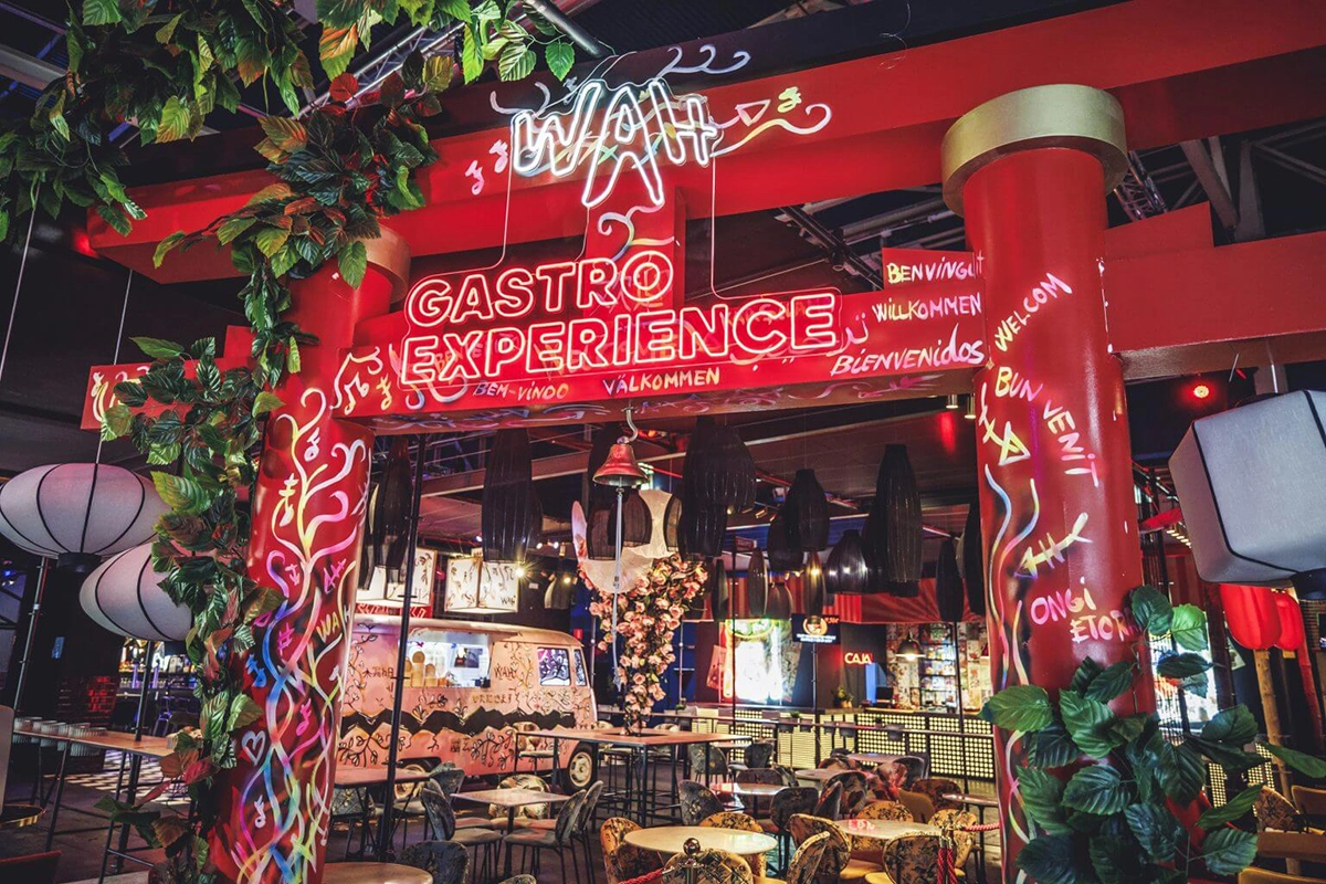 Entrance to Gastro Experience with a red Japanese door