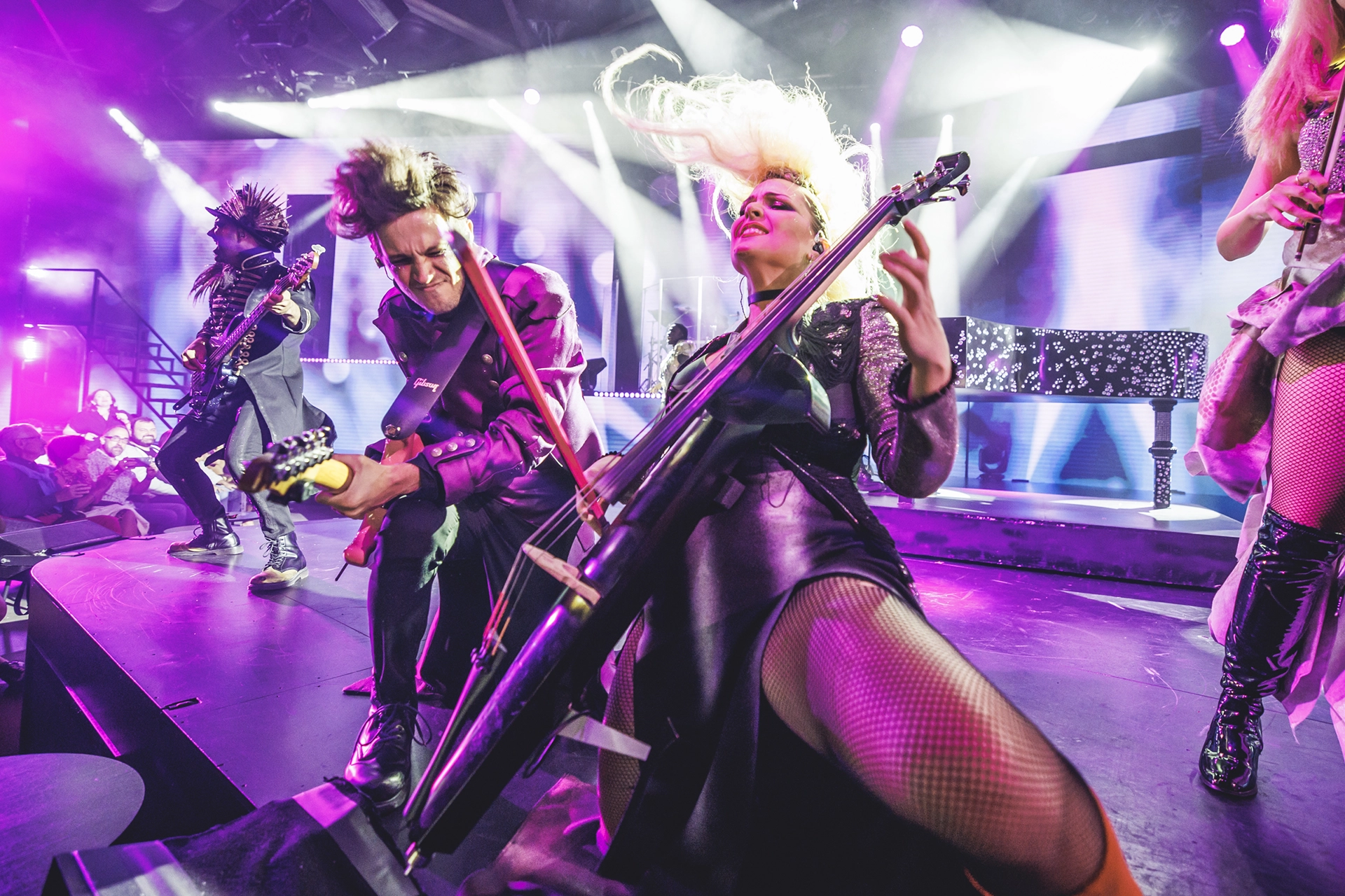 WAH musicians playing, a girl a double bass and a boy a guitar.